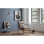 Upholstered in soft touch brown faux leather, suitable for a contemporary setting